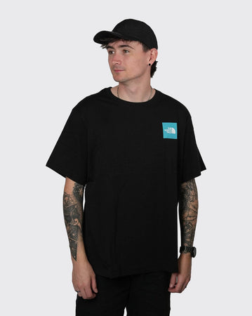 The North Face Unisex Relaxed Puzzle Logo the north face Shirt