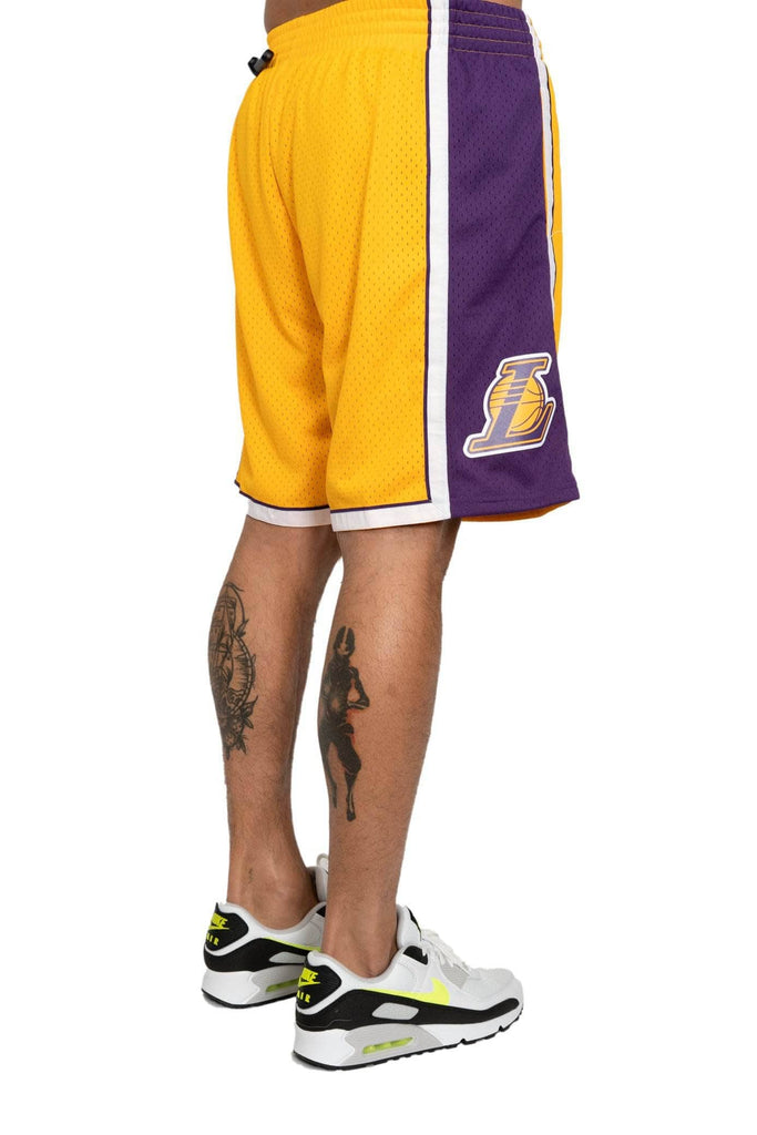 Los Angeles Lakers Hardwood Classics Road Swingman Shorts by Mitchell &  Ness - Yellow - Mens
